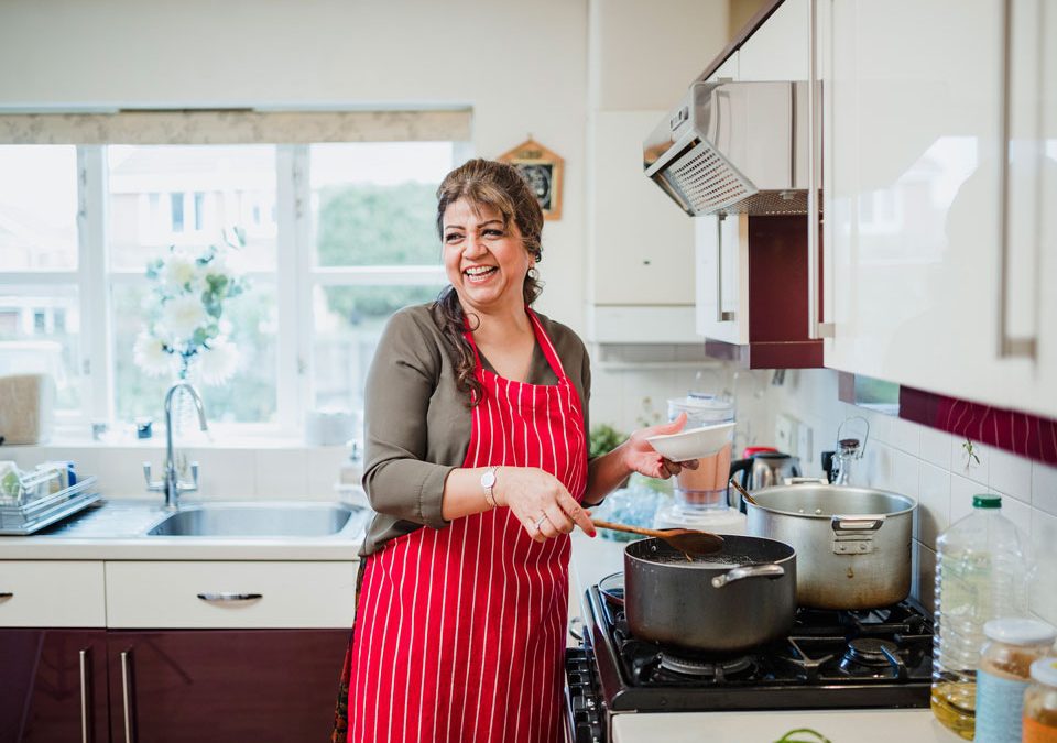 Mature Woman Enjoying Cooking at Home